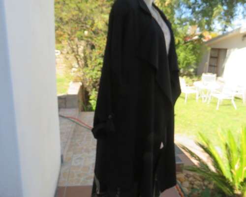 Stunning long black waterfall style loose hanging jacket.Spotless.As new.Bracelet sleeves.Size 42/18