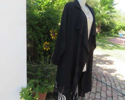 Stunning long black waterfall style loose hanging jacket.Spotless.As new.Bracelet sleeves.Size 42/18