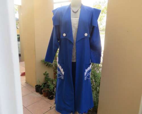Stunning ensemble in royal blue cotton.Kick out skirt with long open embroidered coat size 34.As new