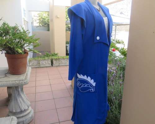 Stunning ensemble in royal blue cotton.Kick out skirt with long open embroidered coat size 34.As new