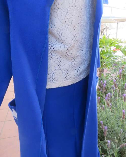 Stunning ensemble in royal blue cotton.Kick out skirt with long open embroidered coat size 34.As new