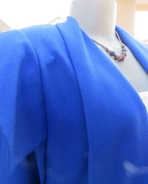 Stunning ensemble in royal blue cotton.Kick out skirt with long open embroidered coat size 34.As new