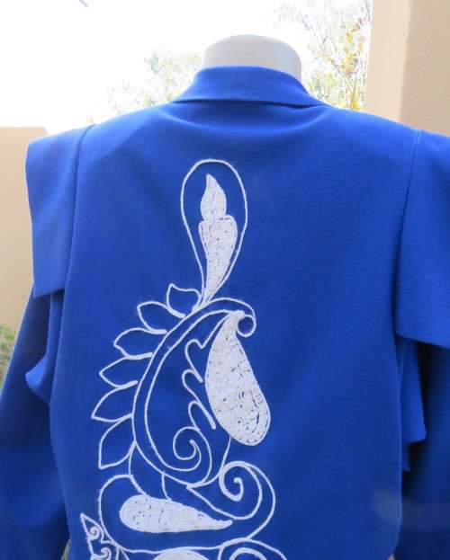 Stunning ensemble in royal blue cotton.Kick out skirt with long open embroidered coat size 34.As new