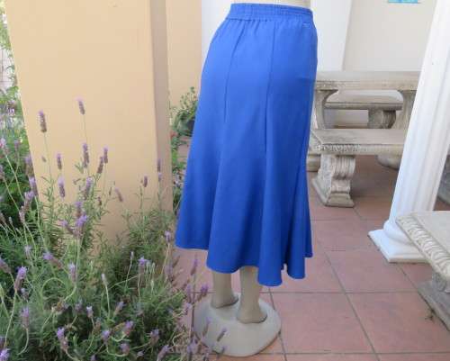 Stunning ensemble in royal blue cotton.Kick out skirt with long open embroidered coat size 34.As new