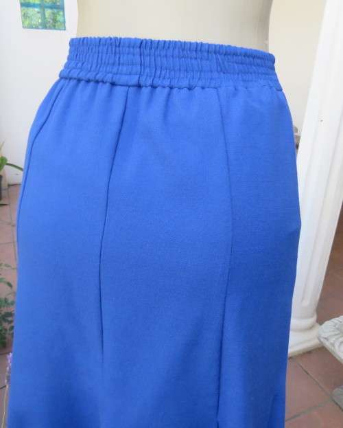 Stunning ensemble in royal blue cotton.Kick out skirt with long open embroidered coat size 34.As new
