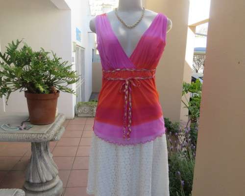 Super sexy cross over top in sheer pink/crimson fabric.Braiding with gold in waist.Size 36.By OASIS.