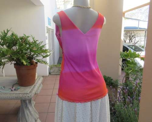 Super sexy cross over top in sheer pink/crimson fabric.Braiding with gold in waist.Size 36.By OASIS.
