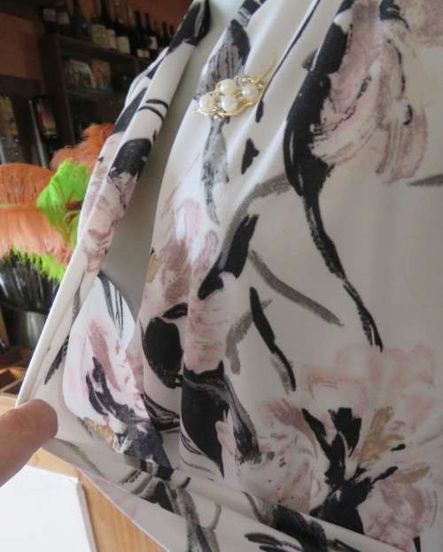 Amazing cross over high neck white/pink/grey floral long sleeve top.Size 42/18 By MILADY`S. As new.