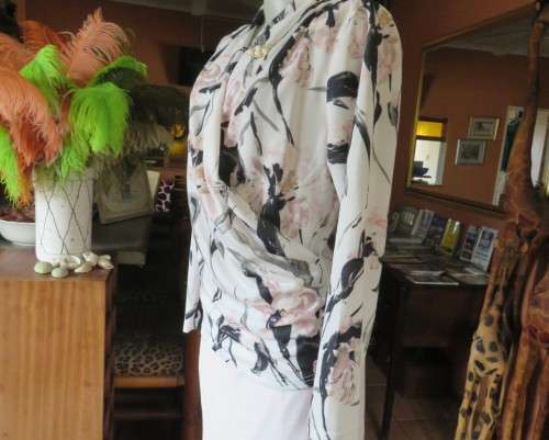 Amazing cross over high neck white/pink/grey floral long sleeve top.Size 42/18 By MILADY`S. As new.