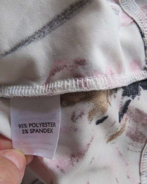 Amazing cross over high neck white/pink/grey floral long sleeve top.Size 42/18 By MILADY`S. As new.