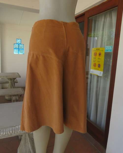 Corded calf length A Line skirt in granola with unique front panels.Size 38/14.Bandless.As new