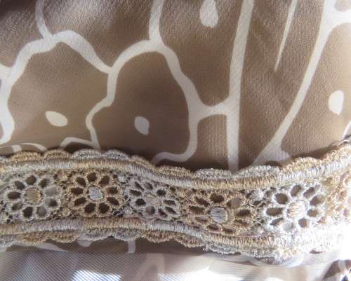 Fabulous 80`s vintage dress in ecru/white.Dropped waist with pleated bottom.By LARGELY FEMININE.46.