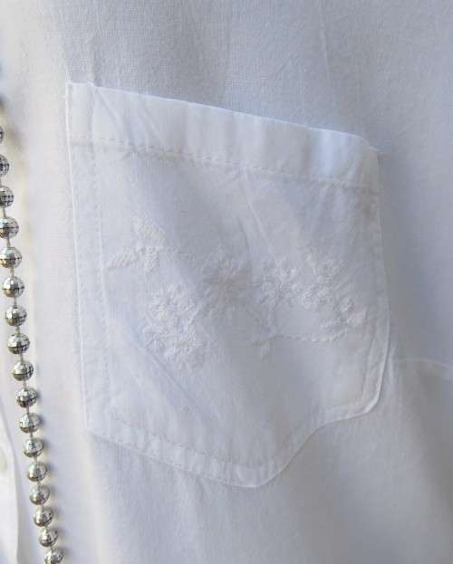 Snow white sleeveless summer top.Button down with shirt collar.By WOOLWORTHS size 38/14.As new.