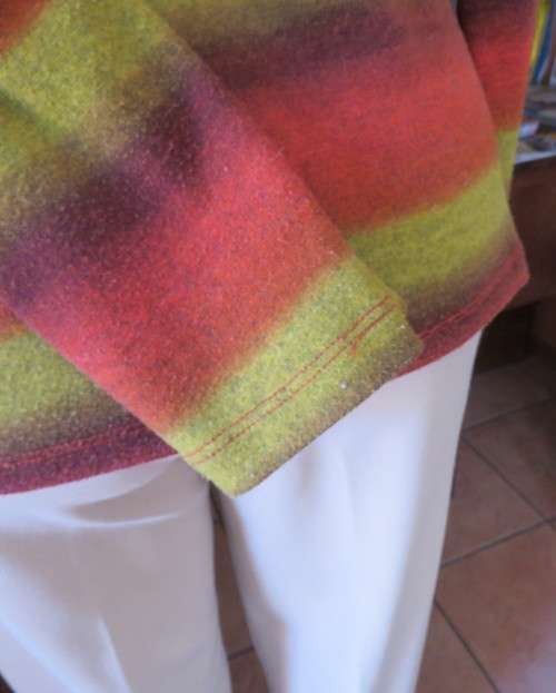 Warm mustard/coral/brick colour striped long sleeve stretch poly top.Size 38 by EXACT.Cross over