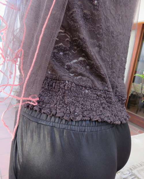 Glamour soot black stetch lace with netting overlay top.One sleeve/one strap.Size 38 by RIMODA.