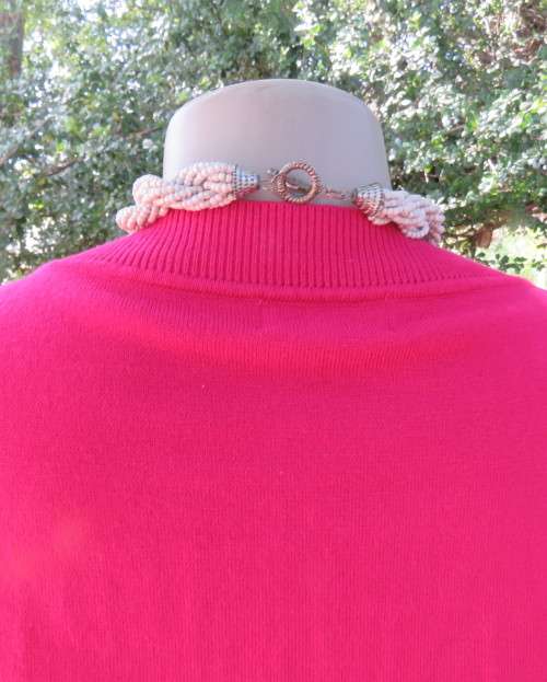 Beautiful, as new, magenta pink pull over knitted V neck top in acrylic/nylon.Size 36/38.WOOLWORTHS