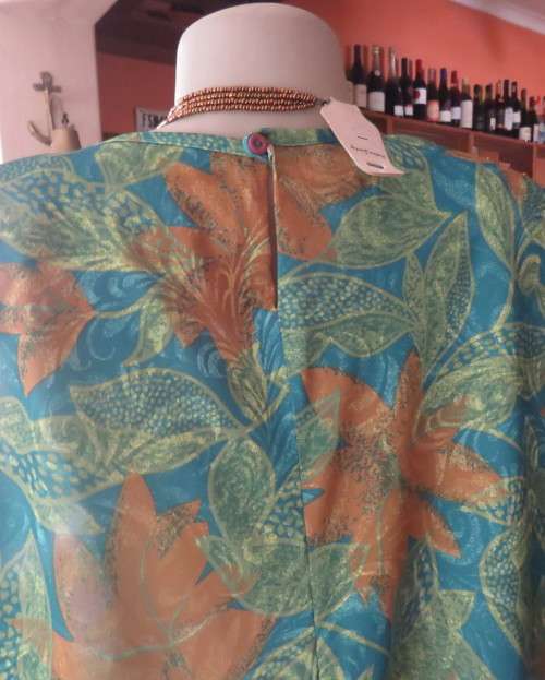 As new vintage dropped waist dress in cool greens and turquoise.Size 44/20 b PRODUCTION STREET.