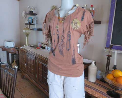 Unique golden brown LEGIT size 34/10 slip over top.Fringed armholes.Front feather/gold patterned.