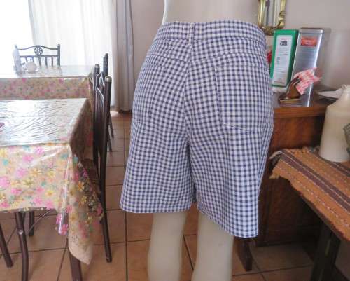 Classic navy/white check 100% cotton shorts by NEWS size 40/16.Yoked back.New condition