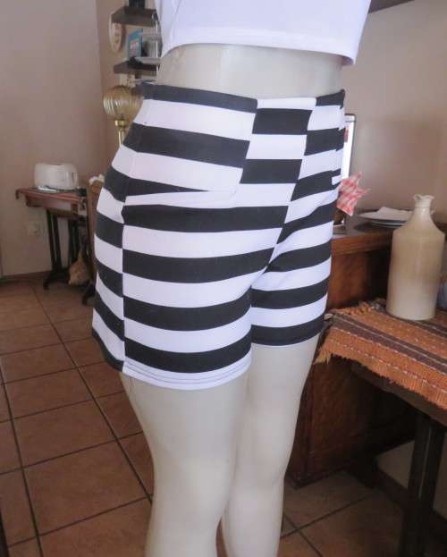 Stunning high waisted black/white striped stretch polyester size 34 shorts.By RT.As new.
