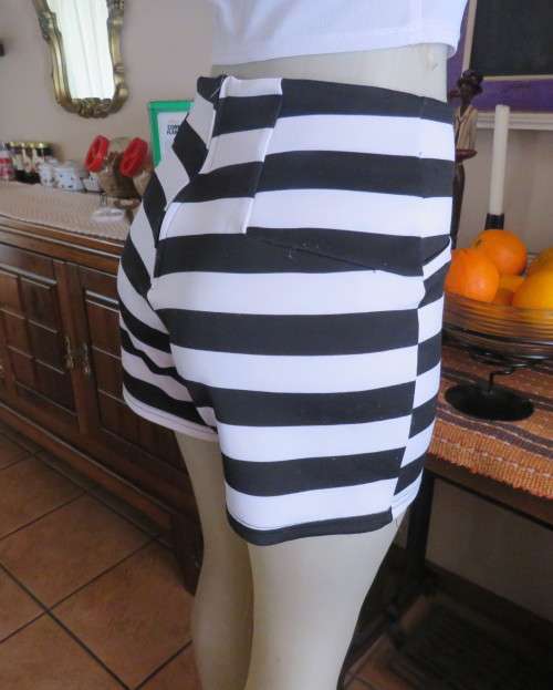 Stunning high waisted black/white striped stretch polyester size 34 shorts.By RT.As new.