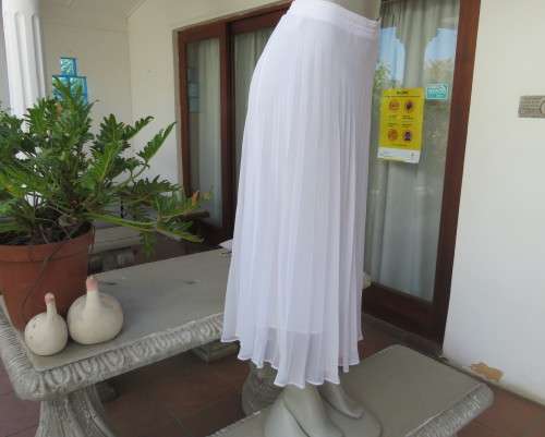Beautiful permanent pleated white sheer polyester/lined ankle length skirt.By WOOLWORTHS size 34/10