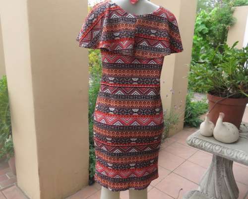 Eye catching graphic printed autumn colour slip over dress. Bertha collar by JUDY`S PRIDE size 36