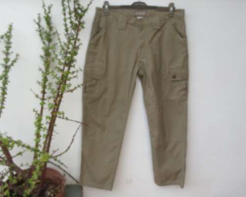 High quality SNIPER TACTICAL khaki colour 100% pants size 36.Pockets galore.New cond.