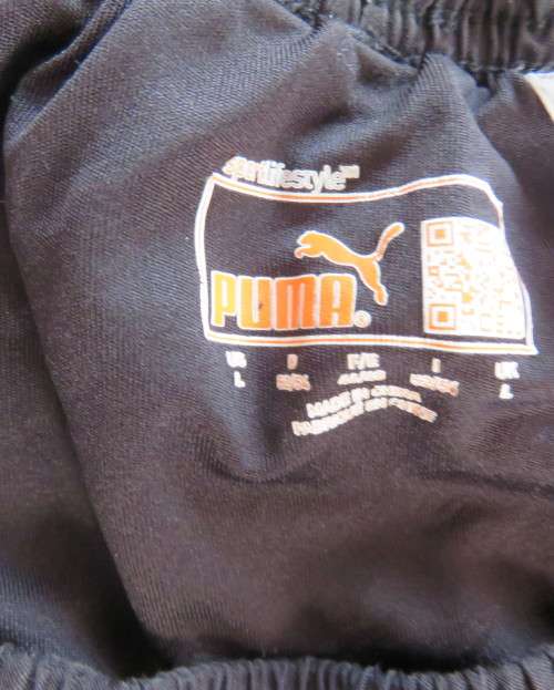 PUMA men`s black sports shorts size Large. In poly/nylon with cool cell. Fold over sides.Good cond.