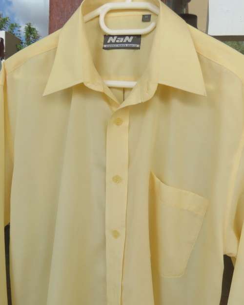 Men`s classic long sleeve butter yellow shirt by NAN size Medium.One pocket.Yoked back with pleat.