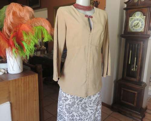 Ultra chic wheat shade slip over long sleeve top in suede look.Brown decor stitching.Size 36 by NEWS