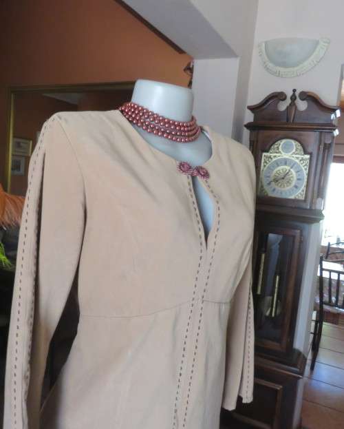 Ultra chic wheat shade slip over long sleeve top in suede look.Brown decor stitching.Size 36 by NEWS