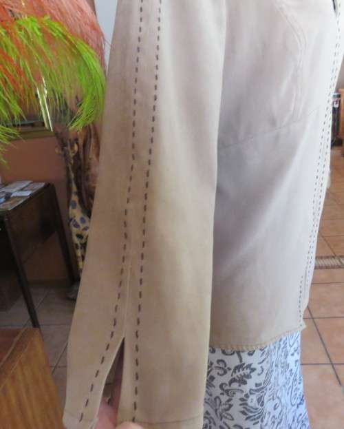 Ultra chic wheat shade slip over long sleeve top in suede look.Brown decor stitching.Size 36 by NEWS
