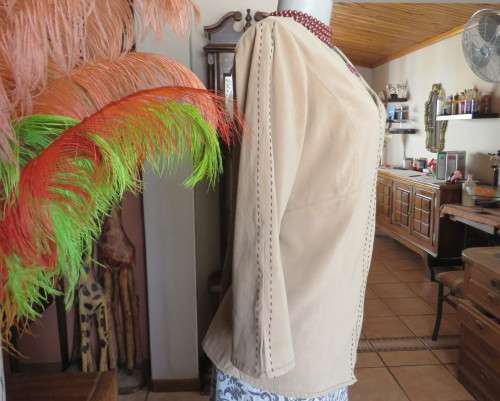 Ultra chic wheat shade slip over long sleeve top in suede look.Brown decor stitching.Size 36 by NEWS