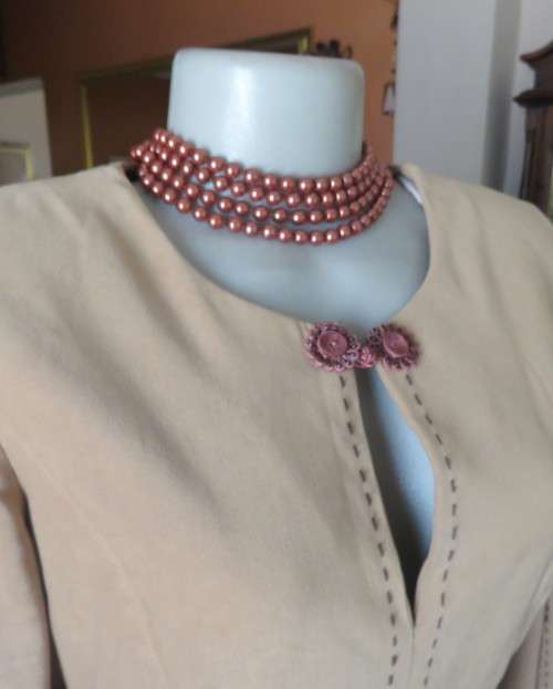 Ultra chic wheat shade slip over long sleeve top in suede look.Brown decor stitching.Size 36 by NEWS