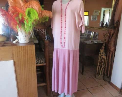 Comfy dropped waist 100% viscose slip over dress in shades of pink.Kimono sleeves.Size 40.Good cond.