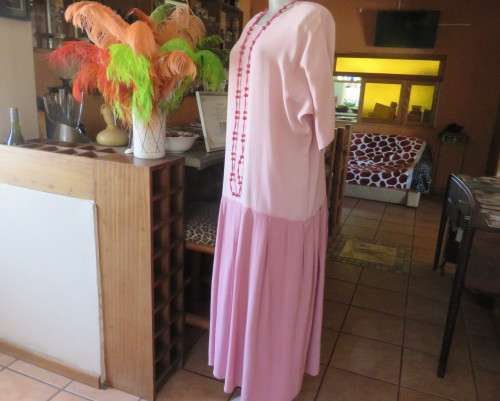 Comfy dropped waist 100% viscose slip over dress in shades of pink.Kimono sleeves.Size 40.Good cond.