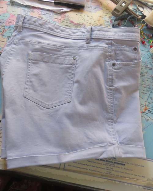 Powder blue firm cotton stretch shorts by EDITION size 36/12.Pockets front and back.Used only twice.