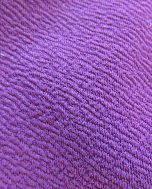 Sexy bodycon violet colour textured stretch polyester skirt.By RT size 34.Left front slit.As new