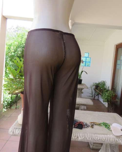 Brown stretch netting wide legg pants to wear under long tops.Size 36 to 38.By PIPPA`S in Vogue.New