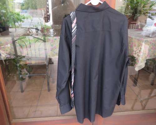 Brand new black polycotton long sleeve Men`s smart shirt by CIGNAL size XL.Free matching tie.