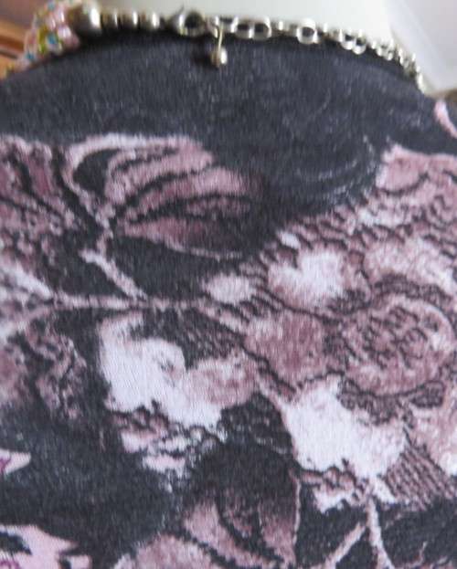 Stunning sheer black long sleeve top. Pale pink flowers on top layer.Size 34 by GOLD.Cord decoration