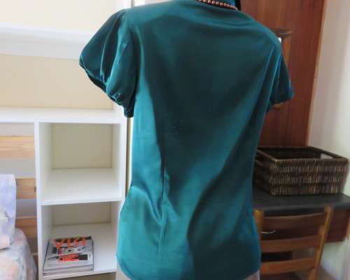Snazzy emerald green soft silky stretch polyester MARKS & SPENCER top.Size 40/42.Capped sleeves.