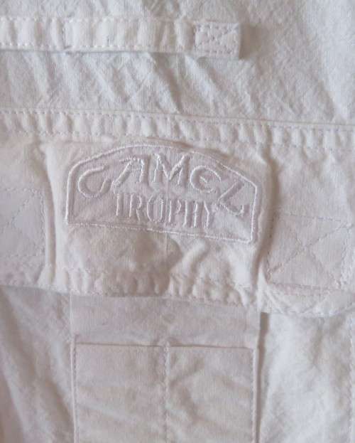 Best quality white 100% cotton CAMEL TROPHY short sleeve shirt.Two bellow pockets.Size L.New cond.