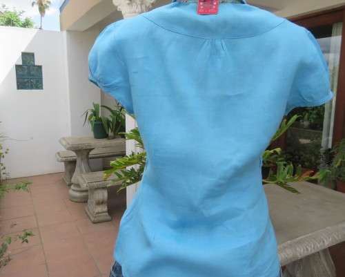 KELSO linen top with button down V front with collar in sky blue size 36/12.Tucked bib on front.