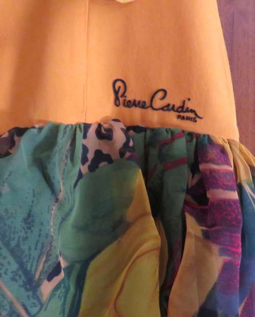Cheeky mustard and sheer floral frilled dress for 8 to 9 yr old girl.(76cm) bust.New condition.