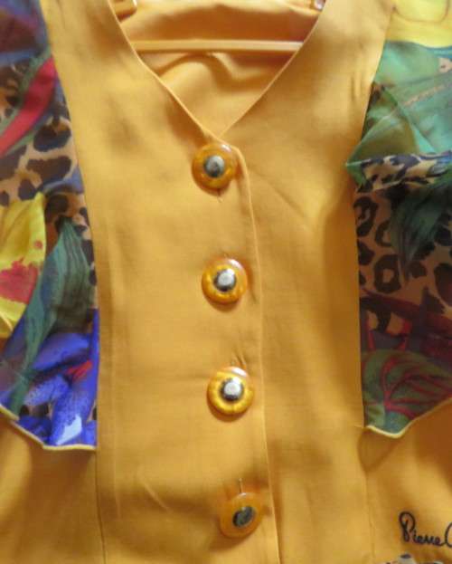 Cheeky mustard and sheer floral frilled dress for 8 to 9 yr old girl.(76cm) bust.New condition.