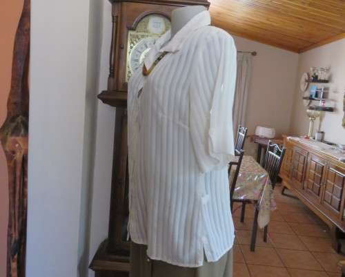 Classic sheer vertical striped polyester short sleeve top.Button down.Open collar.Size 36.Good cond