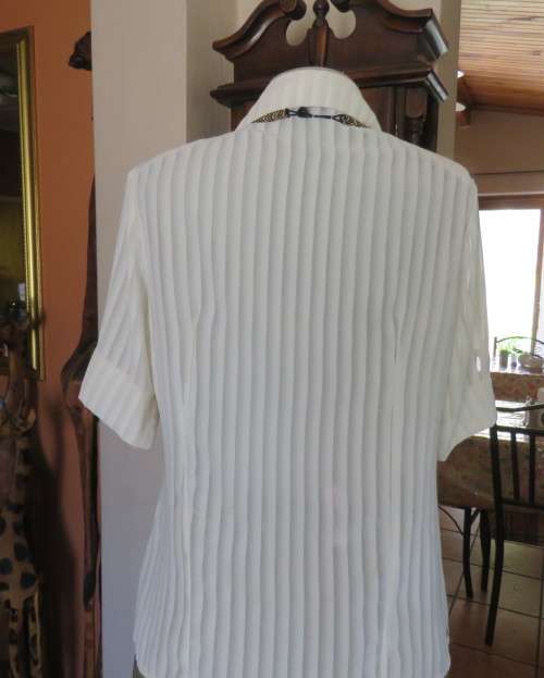 Classic sheer vertical striped polyester short sleeve top.Button down.Open collar.Size 36.Good cond