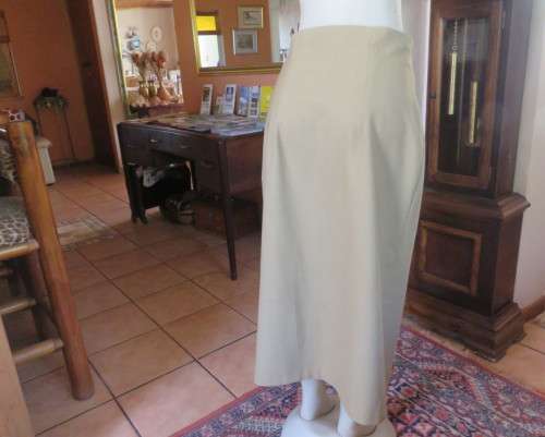 High waisted pickle green bandless button down skirt in heavy polycotton.Low calf length Size 40/16.
